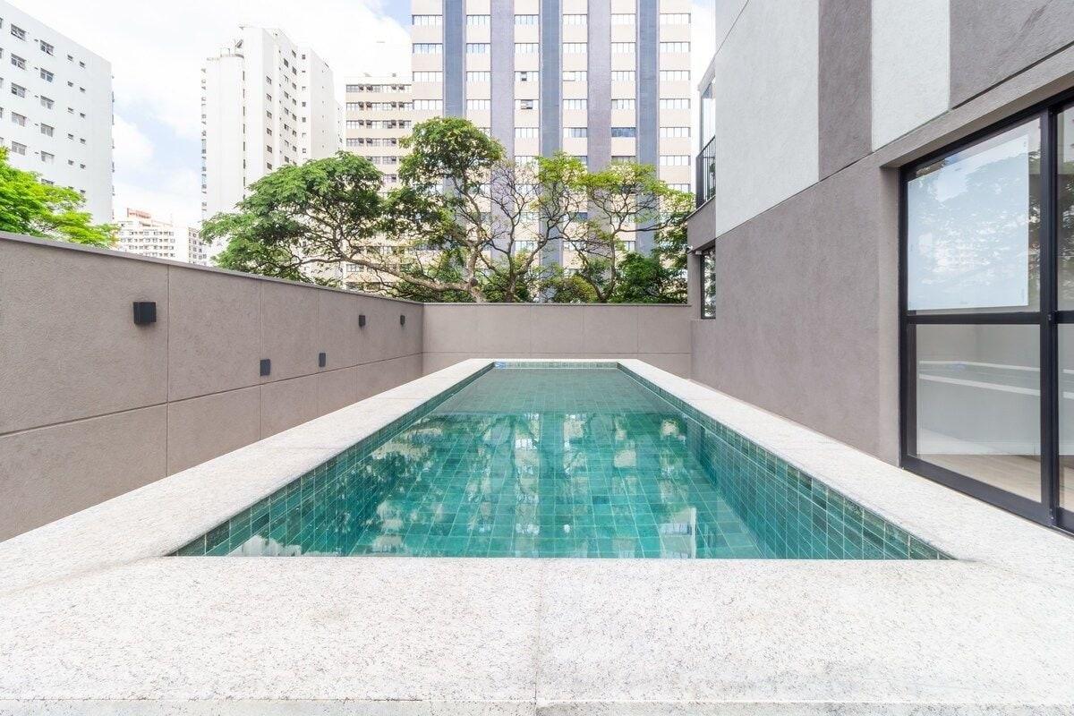 Newly Renovated Apartment with Balcony, A/C, Pool, and Wifi